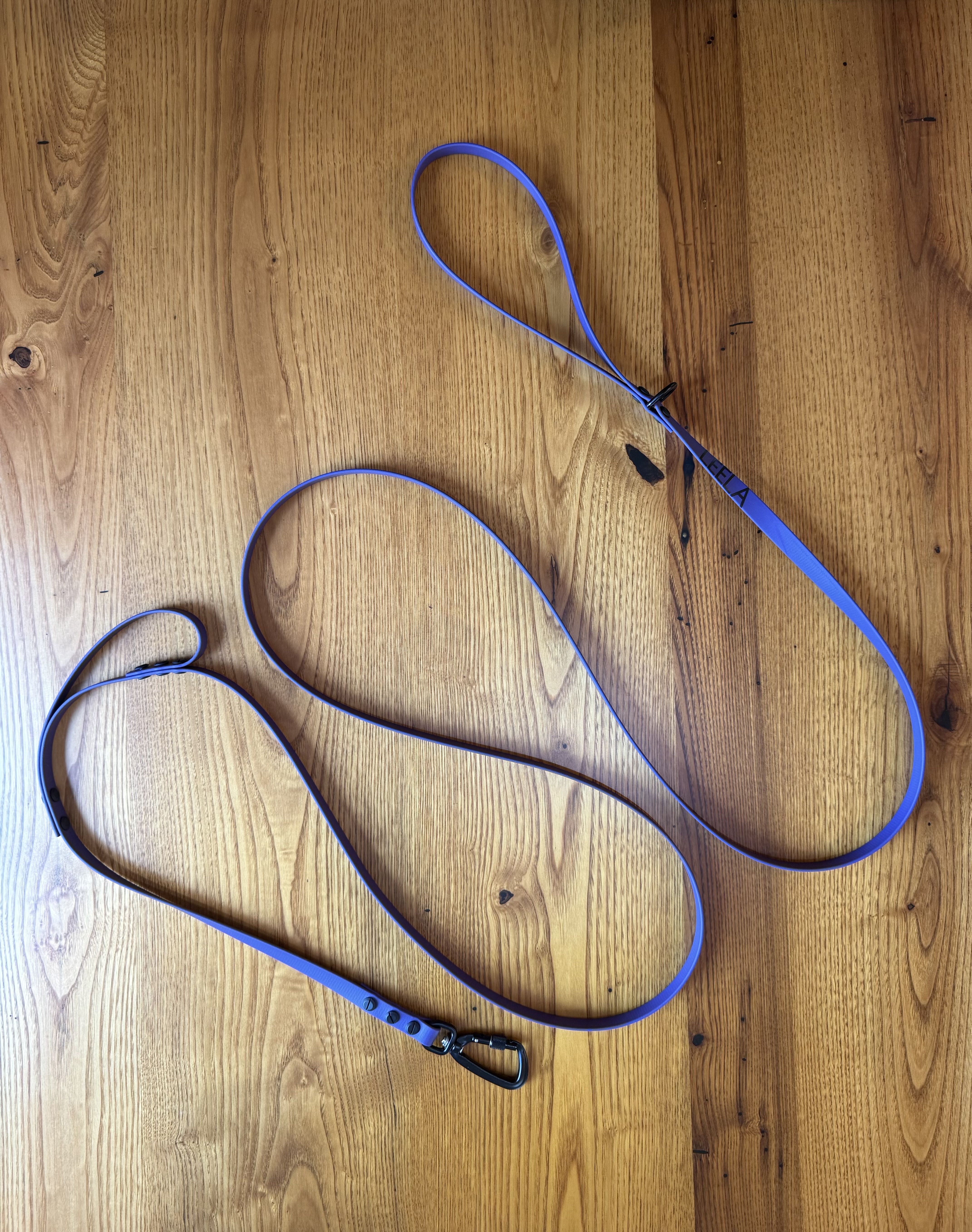 Item: Custom long line | Length: 12 ft | Width: 5/8 in | Colors: Violet | Hardware: black with locking carabiner | Custom: Built-in traffic handle 18 in above base