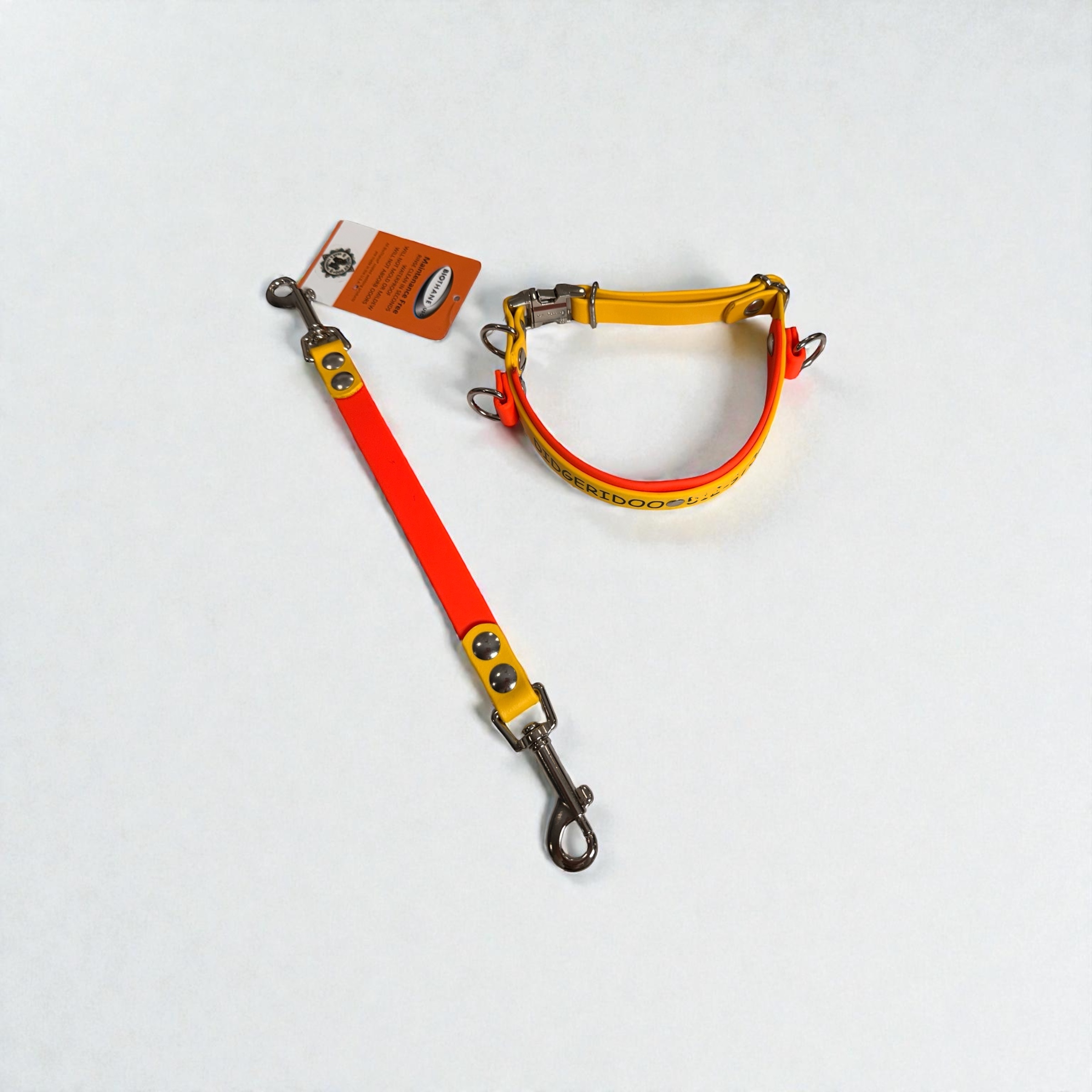 Item: Custom 2-layer collar with detachable handle | Width: Collar is 1 in & 5/8 in, handle is 5/8 in | Colors: Orange base with Yellow accent | Hardware: silver | Custom: Integrated control handle for extra grip or quick grab, plus name detail