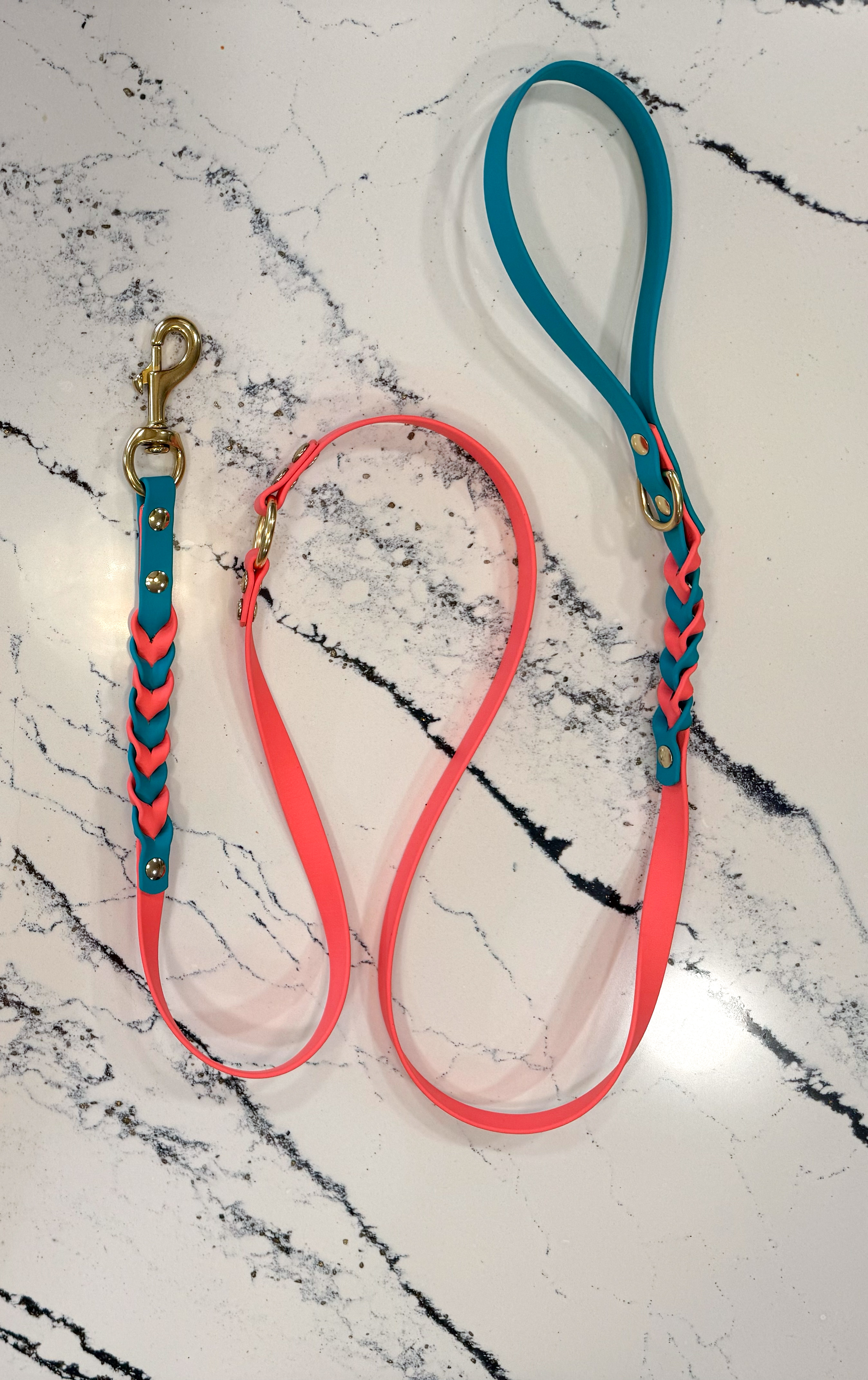 Item: Custom braided leash | Width: 5/8 in | Colors: Coral & Teal | Hardware: brass