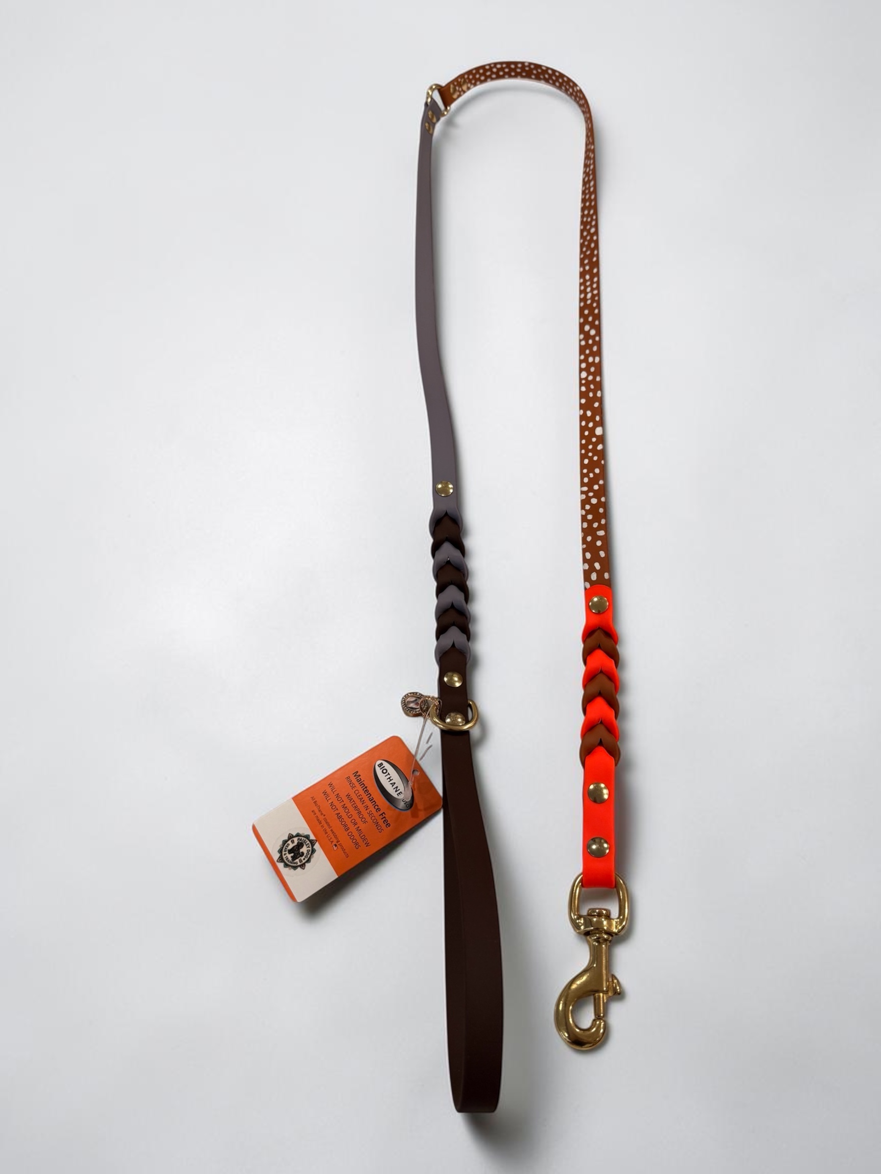 Item: Custom braided leash made to look like Zebra Finch | Width: 5/8 in | Colors: Orange, Light brown with custom white painted dots, Dark Brown, and Gray | Hardware: brass