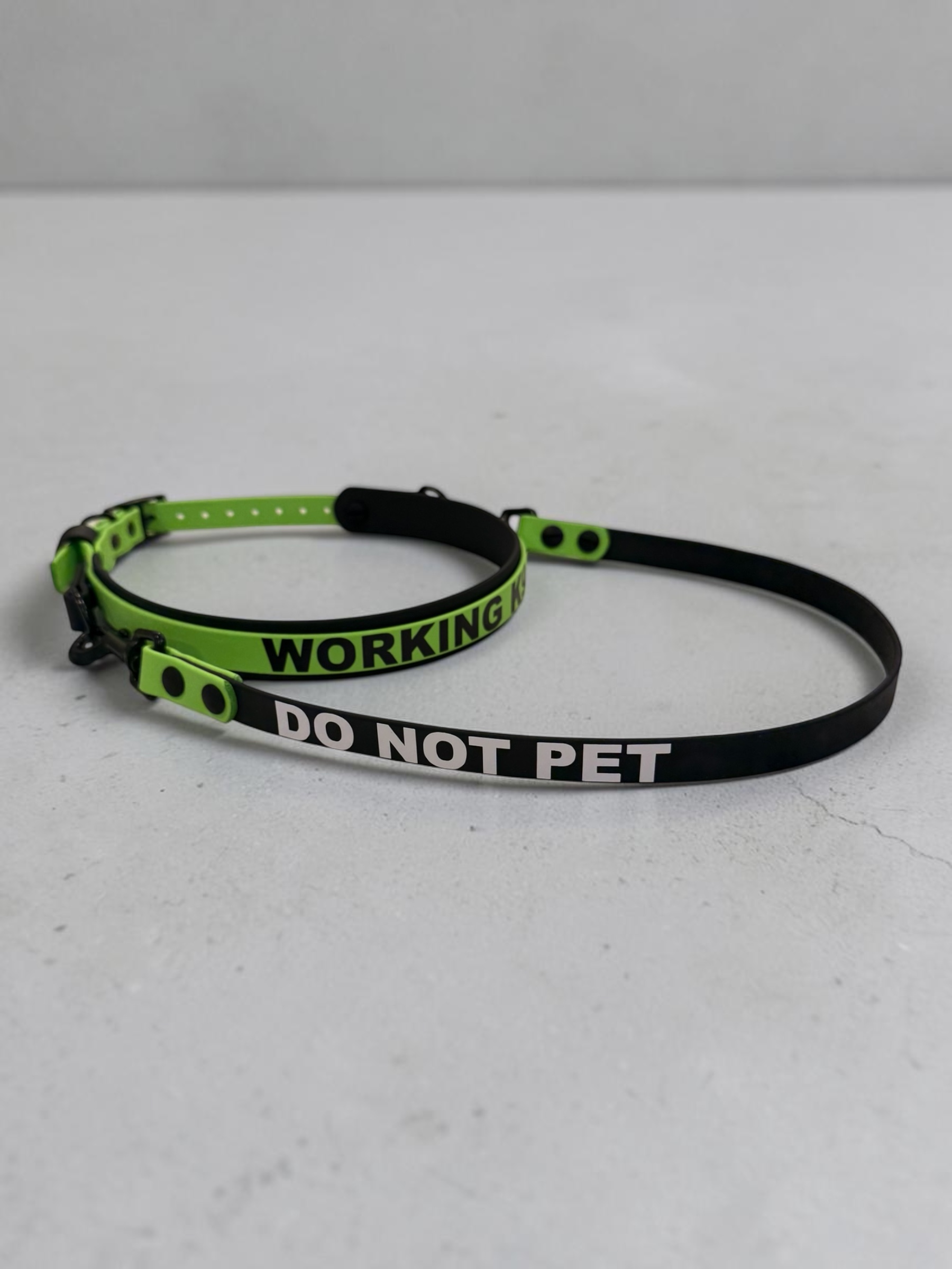Item: Custom 2-layer collar with detachable handle | Width: Collar is 1 in & 5/8 in, handle is 5/8 in | Colors: Black base with Green (525) accent | Hardware: black | Custom: Integrated control handle for extra grip or quick grab, HTV details on collar and handle