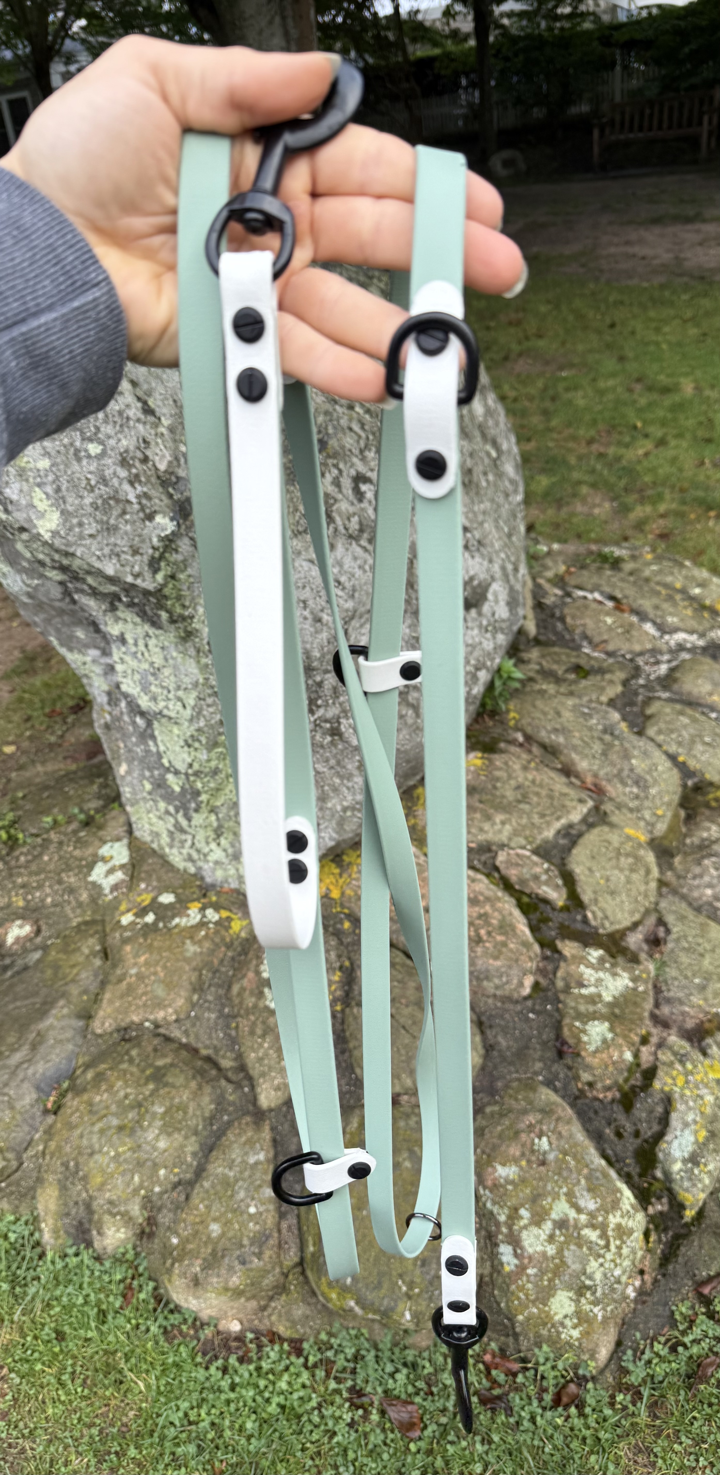 Item: The Tallulah / hands-free leash system | Length: 8 ft | Width: 5/8 in | Colors: Sage & White | Hardware: black | Custom: Built-in traffic handle at base